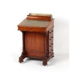 Property of a deceased estate - a Victorian mahogany davenport, 21.1ins. (53.5cms.) wide (overall).