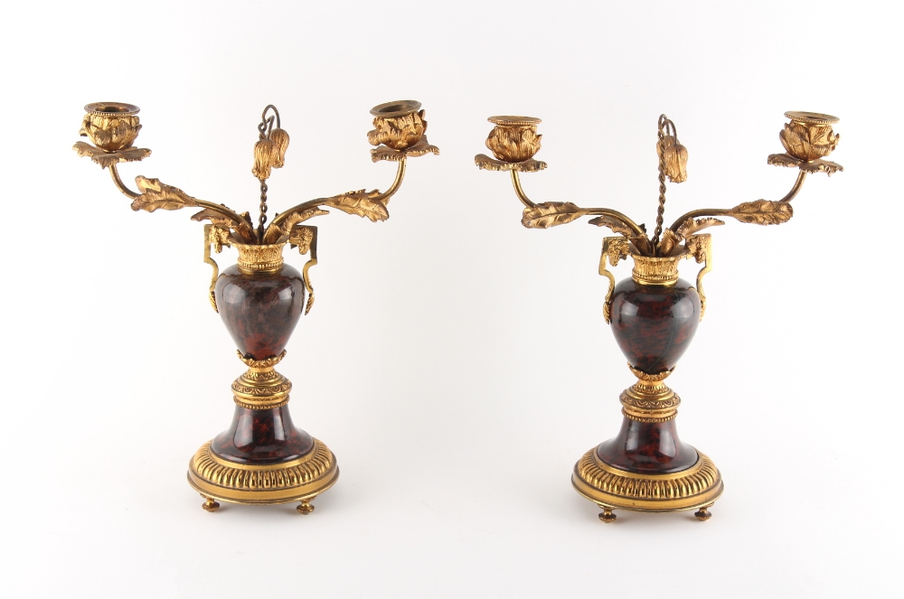 Property of a deceased estate - a pair of ormolu or gilt brass & serpentine marble twin light