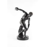 Property of a lady - a well cast 19th century patinated bronze figure of a discus thrower, after the
