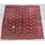 Property of a gentleman - a Turkoman carpet, damages, 87ins. (227cms.) square.