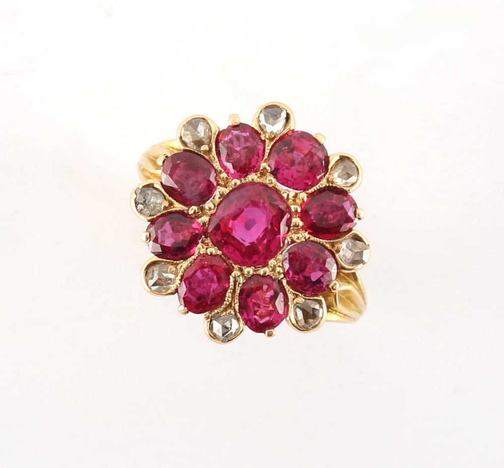 A fine antique ruby & diamond flowerhead cluster ring, set with nine certificated unheated Burmese