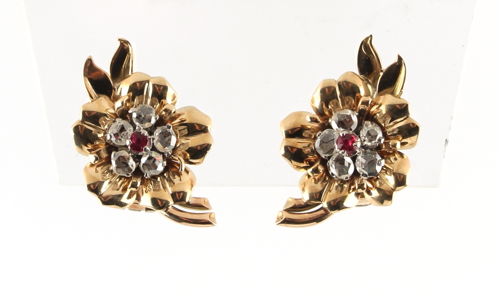 A pair of unmarked yellow gold ruby & diamond earrings, of floral form, each set with five rose