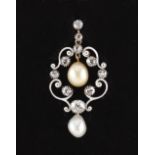 An antique natural saltwater pearl diamond & white enamel pendant, the white enamelled scroll