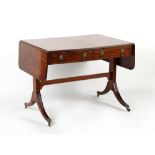 Property of a gentleman - an early 19th century Regency period mahogany sofa table with brass lion