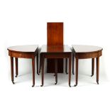 Property of a lady of title - a George III mahogany three-part 'D'-end dining table, with square