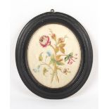 Property of a gentleman - a George III silkwork oval picture depicture three various flowers tied