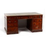 Property of a gentleman - a Victorian mahogany twin pedestal desk with green leather inset top above