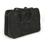 Property of a lady - en suite with the previous lot - a Mulberry black leather holdall or soft case,