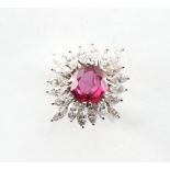 A very good platinum ruby & diamond cluster ring, the unheated cushion cut Thai ruby weighing 2.93