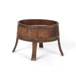 An early 20th century coopered oak & brassbound planter or jardiniere, 31ins. (78.7cms.) wide (