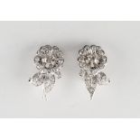 A pair of white gold diamond floral earrings, with clip fastenings, the estimated total diamond