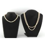 A cultured pearl two row necklace, the uniform pearls approximately 7mm diameter; together with a