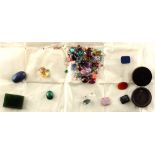 A bag containing assorted gemstones, etc. including two small diamonds, approximately 3 and 4 points