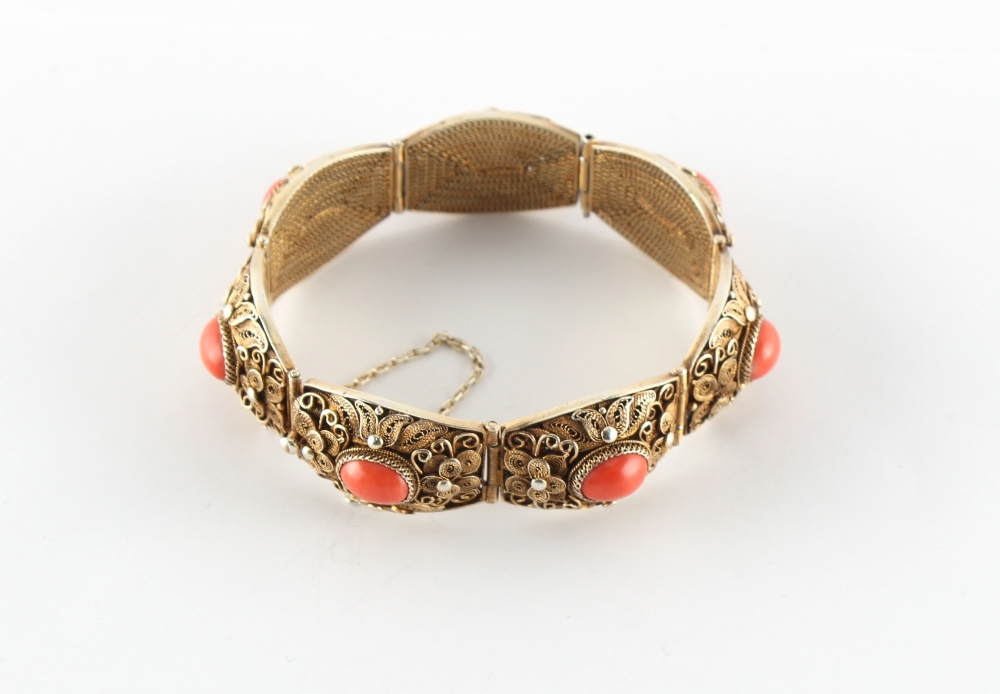 A Chinese silver gilt filigree & coral panel bracelet, approximately 45.6 grams.