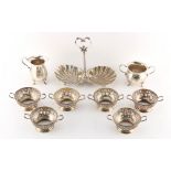 A mixed lot of silver comprising a shell hors d'oeuvres dish, a set of six small two-handled