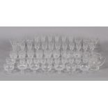 An extensive suite of Waterford Colleen pattern table glass, comprising sixty-five pieces, of nine