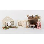 A doll's house toy shop or nursery, with furniture & furnishings, 12ins. (30.5cms.) long; together
