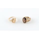 A 9ct gold smoky quartz ring, size M, boxed; together with a 9ct gold signet ring, size Q, boxed (