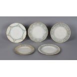 Five unglazed Minton pate sur pate plates, one by Alboin Birks (signed), 10.25ins. (26cms.)