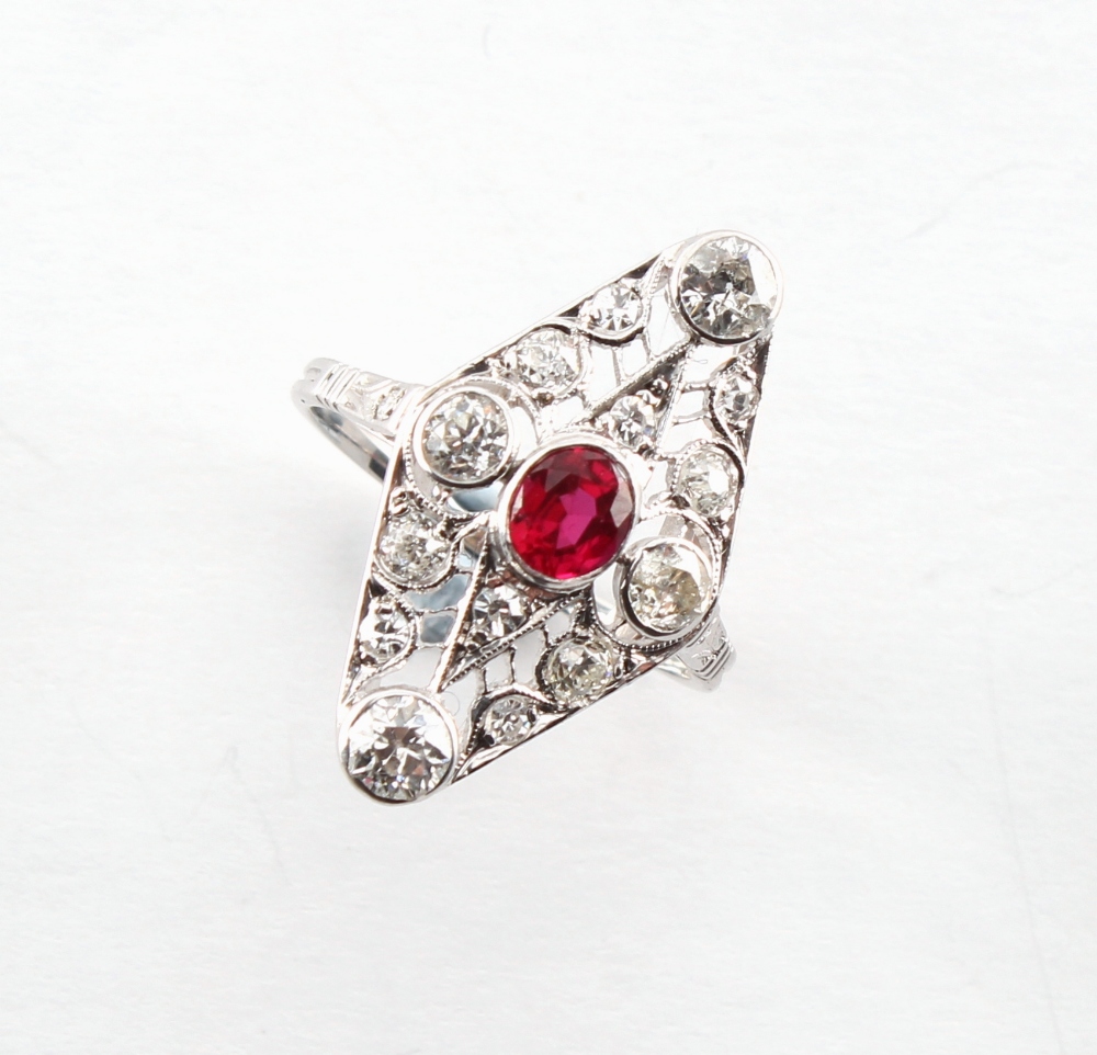 A Belle Epoque style ruby & diamond ring, with Old European cut diamonds & single cut diamonds in