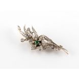 A Victorian emerald & diamond floral spray brooch, 59mm long.
