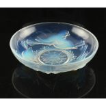 An Art Deco moulded opalescent glass bowl depicting lovebirds, signed 'EZAN / FRANCE', 9.85ins. (