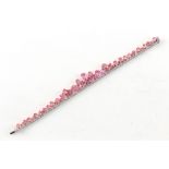 William & Son, London - a very attractive pink sapphire & diamond fringe bracelet, the total pink