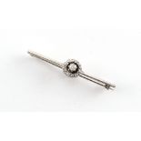 An early 20th century white gold diamond cluster pin brooch, 45mm long, approximately 2.8 grams.