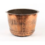 A copper log bin, 22.5ins. (57cms.) diameter.
