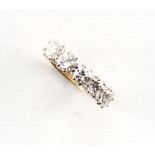 An 18ct yellow gold diamond five stone ring, set with five uniform round brilliant cut diamonds, the