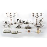 A quantity of silver plated items including a pair of Old Sheffield Plate candelabra, each 18.75ins.