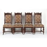 A set of four late 19th century carved walnut side chairs, possibly Irish, one castor detached (4).