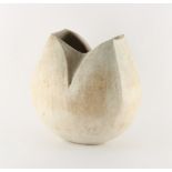 John Ward (b.1938) - a hand-built stoneware vase of tulip form, with matt glaze, hairline crack to