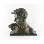 Johannes Dommisse (Austrian, 1878-1955) - a bronze coloured terracotta bust of a young man, on