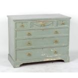 An Edwardian blue painted pine chest of three short & three long graduated drawers, 41.5ins. (105.