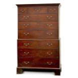 An 18th century George III mahogany tallboy or chest-on-chest, with brass swan-neck handles, on