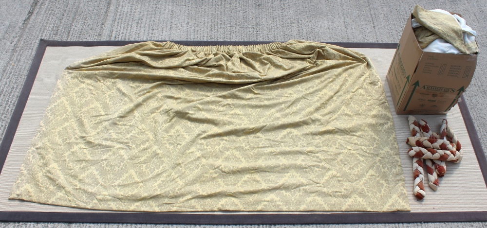 A pair of gold brocade curtains, lined, each 91 by 120ins. (231 by 304cms.); together with a