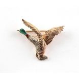 A 9ct three colour gold & enamel brooch modelled as a drake mallard duck, 36mm across, approximately