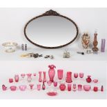 A mixed lot including cranberry glass items, silver plated items, ceramics, a lamp, and an oval