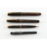 Two Parker Vacumatic fountain pens, one barrel end button missing; together with a matching