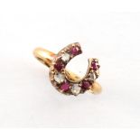 A Victorian 18ct gold ruby & diamond horseshoe ring, size J, boxed.