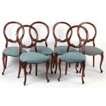 A set of six Victorian style mahogany balloon back dining chairs, with pale blue upholstery &