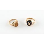 A 9ct gold Bunny signet ring, size L/M; together with a 9ct gold tiger's eye ring, size I/J (2).