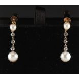 A pair of 15ct yellow gold pearl & diamond pendant earrings, with screw fastenings, each with a