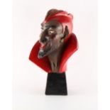 An Art Deco painted terracotta bust of 'Old Nick' or the Devil, or possibly a character from