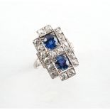 A good Art Deco style sapphire & diamond ring, the two round cut sapphires weighing approximately