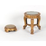 A 19th century carved giltwood stand, 16.2ins. (41cms.) high; together with a similar footstool (2).