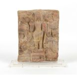 Property of a gentleman - a carved stone rectangular panel, South East Asia, mounted on a perspex