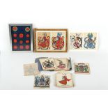 Property of a lady - a folio containing approximately 70 hand-painted watercolour heraldic family