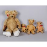 Property of a lady - a large vintage teddy bear, in need of attention, wood wool filled, 37ins. (